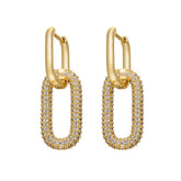 Ein Paar Damen Creolen mit Anhänger wahlweise mit dunkel blauem oder weißem Zirkonia Stein, vergoldet